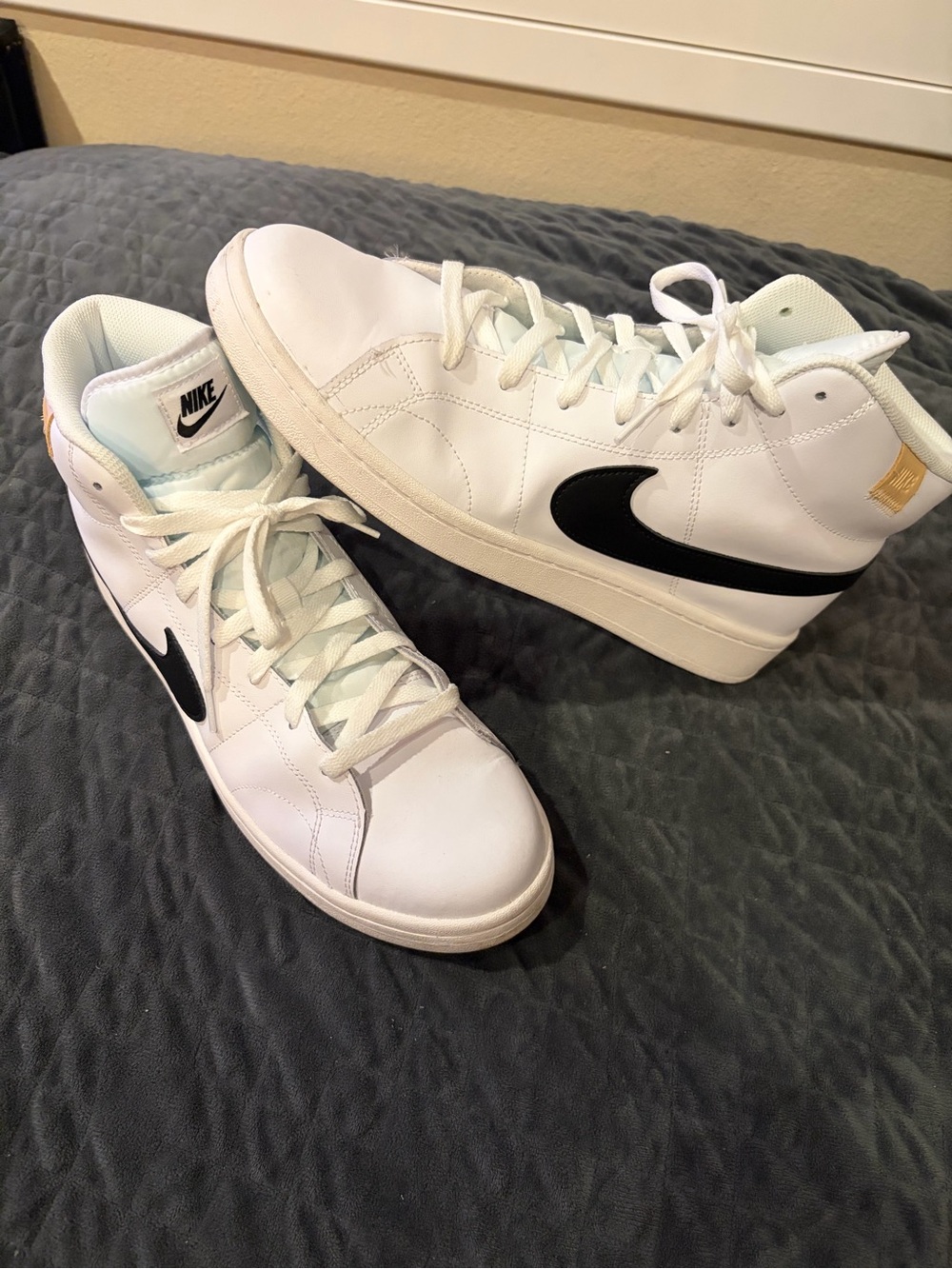 Nike Blazer White High-Top Sneakers with Black Swoosh